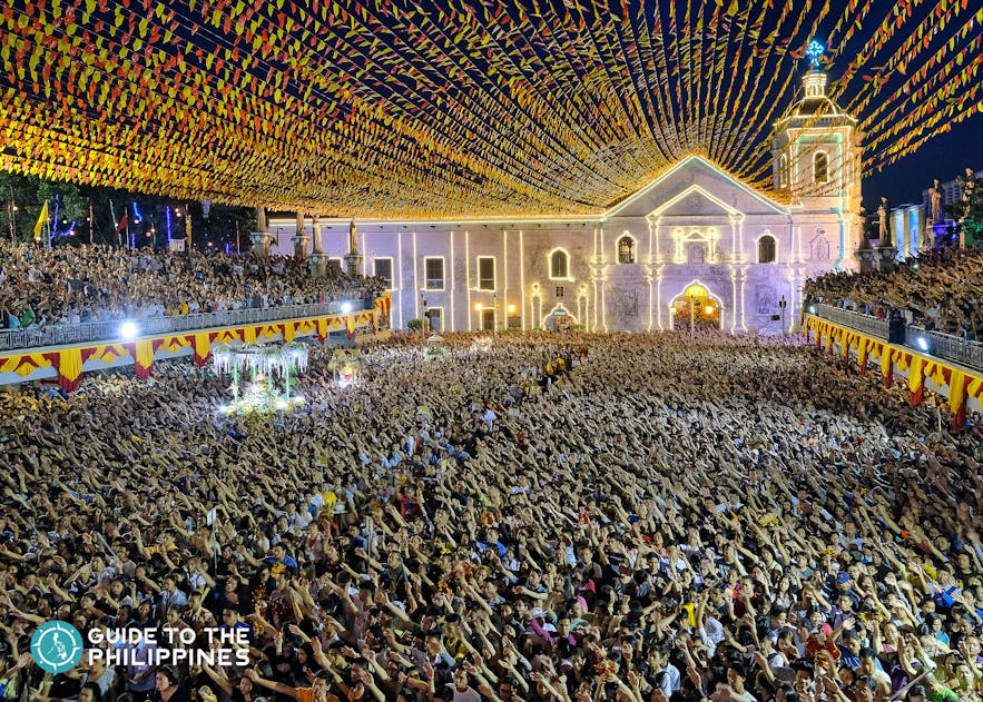 Devotees at the solemn procession during Sinulog Festival in Cebu, Philippines
