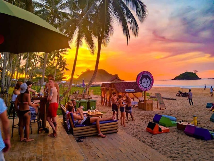 Sunset view at Mad Monkey Hostel Nacpan Beach in El Nido, Palawan