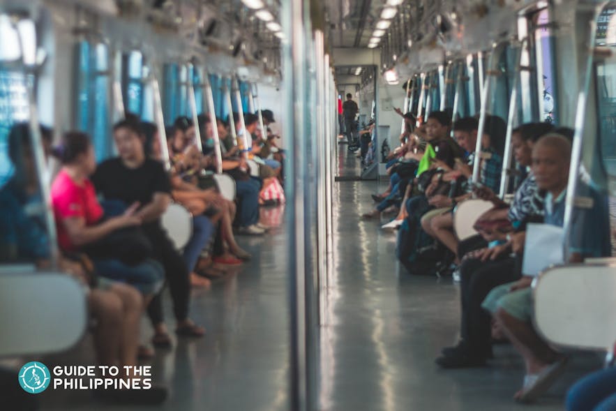Commuters inside the LRT in Manila, Philippines