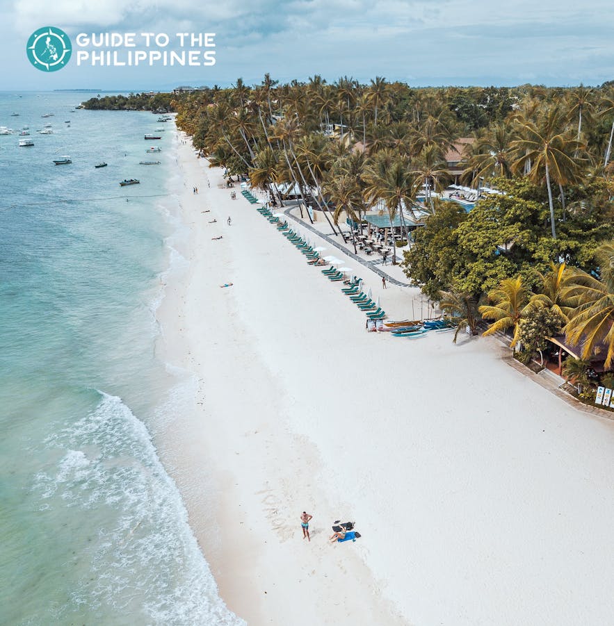 Aerial view of travelers by Alona Beach in Panglao, Bohol
