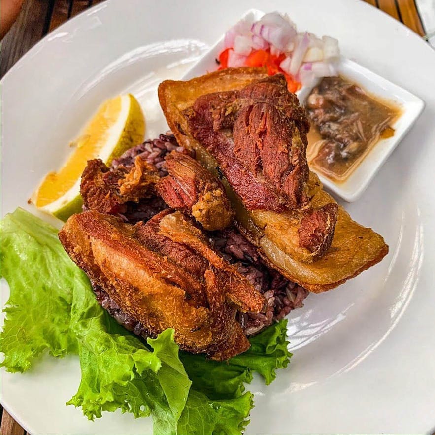 Baguio Bagnet, double fried pork belly paired with padas bagoong and fresh tomato onion relish