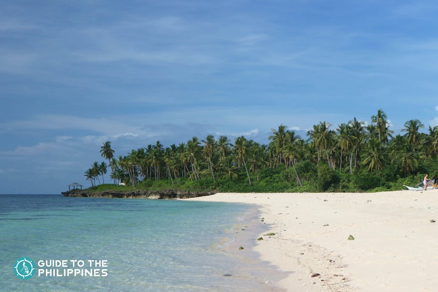 White sand shore of Bakhaw Beach in Camotes Islands