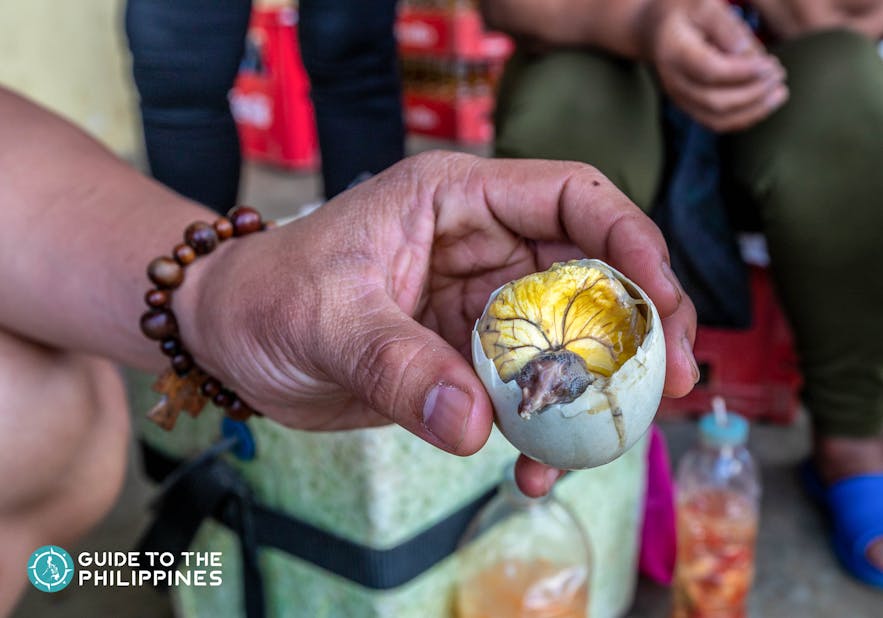 Try Bataan's local eats such as balut, boiled fertilized duck