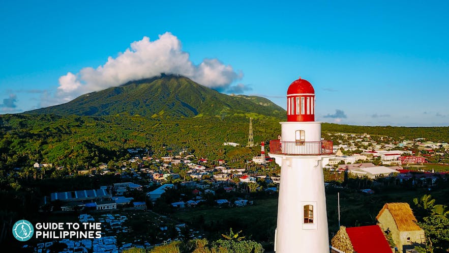 Basco Lighthouse in Basco, Batanes with Mt. Iraya in the background