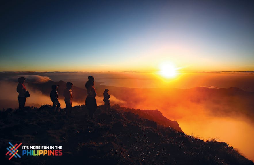 Travelers trek to catch the sunrise at Mt. Apo, the highest peak in the Philippines