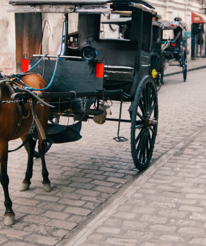 A kalesa, or horse-drawn carriage, parked along Calle Crisologo in Vigan, Ilocos Sur