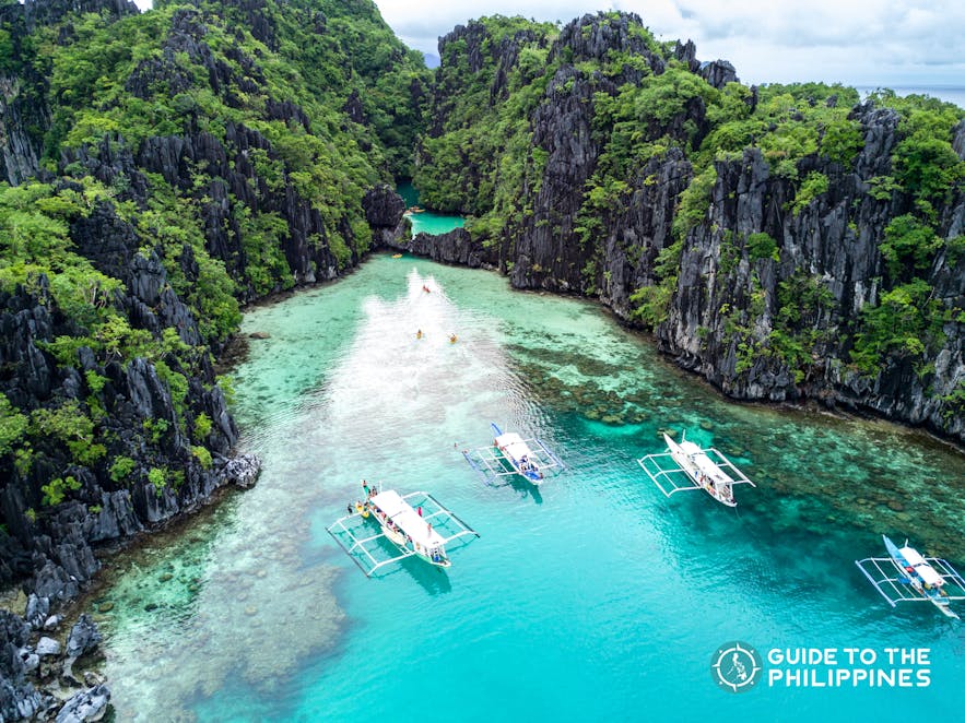 Palawan's limestone karst, white sand beach, and turquoise waters