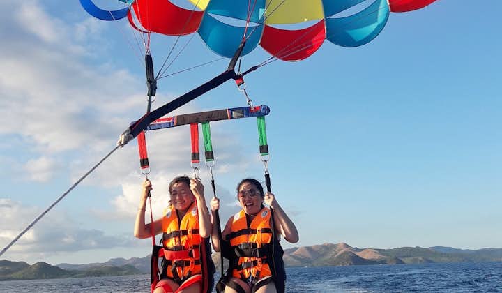 Parasail with your family or friends in Coron