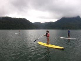 Tourist participating in Stand-Up-Paddle activities