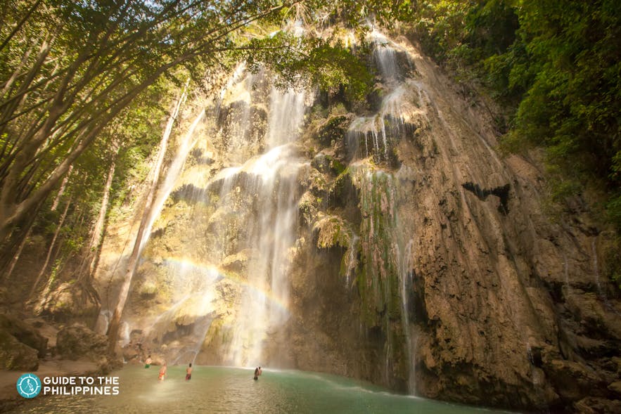 People enjoying the Tumalog Falls, Oslob, Cebu