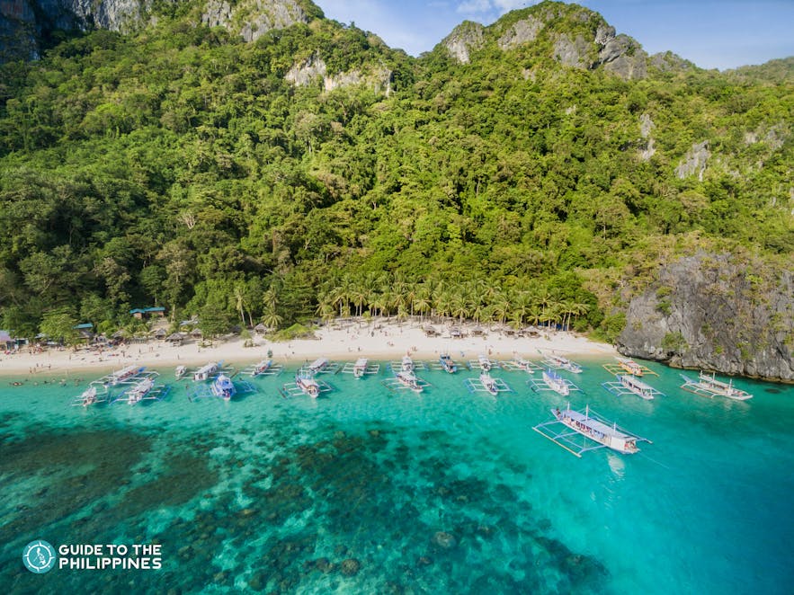 Beach view of boats at Seven Commandos Beach in El Nido, Palawan