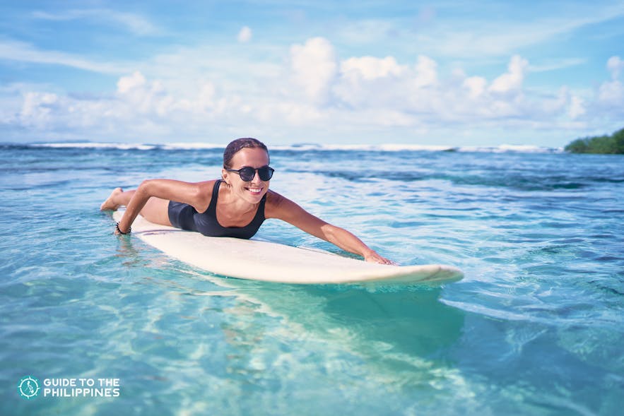 Surfer girl learning how to surf