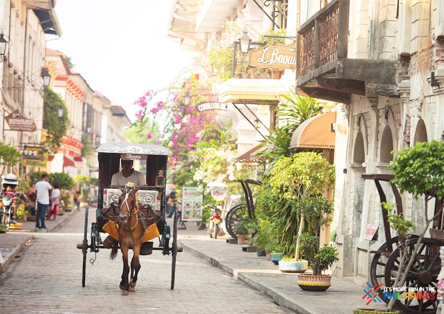 Kalesa at the cobblestone street known as Calle Crisologo in Vigan