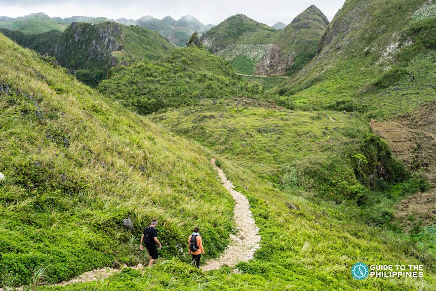 Hikers descending the Osmeña Peak in Dalaguete, Cebu, Philippines