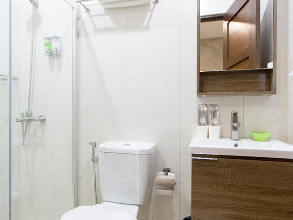 Clean white bathrooms of 18 Suites Cebu