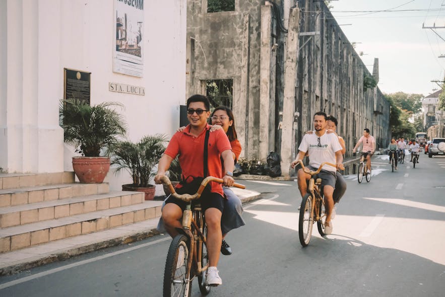 Local travelers going around Intramuros in bamboo bikes