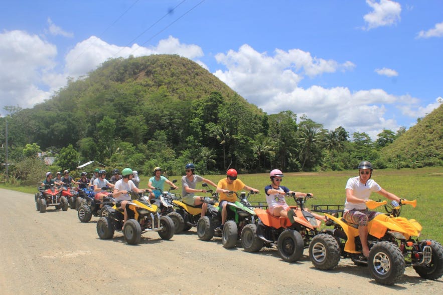 Group of travelers ready for their Chocolate Hills ATV adventure in Bohol, Philippines