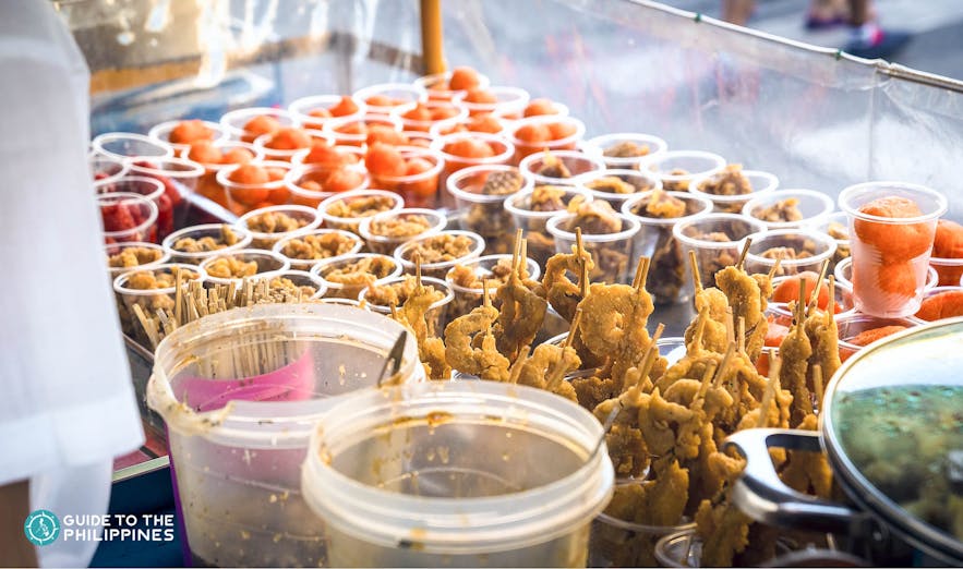 Fried isaw and kwek kwek are popular street food snacks in the Philippines
