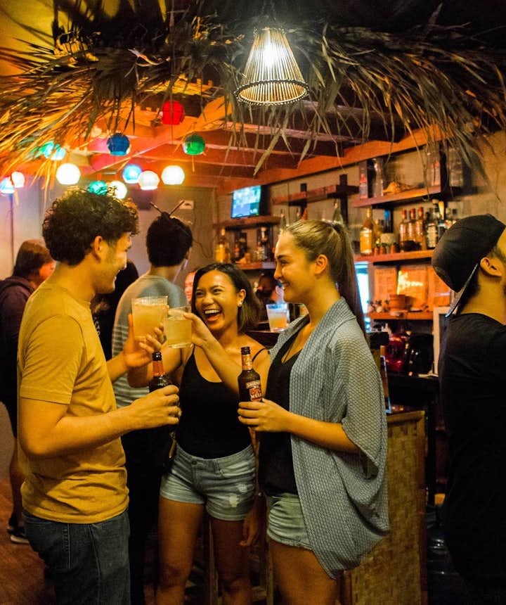 People drinking in a bar in Makati