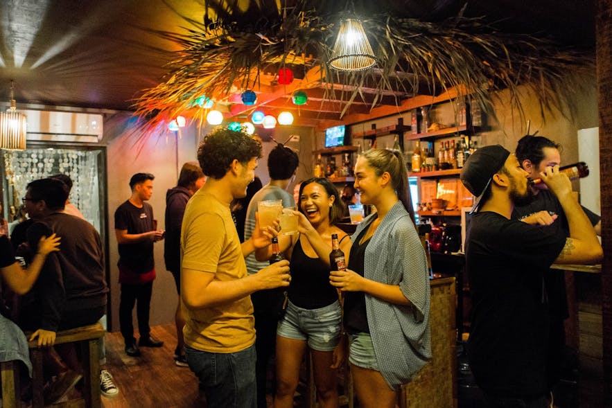 People drinking in a bar in Makati