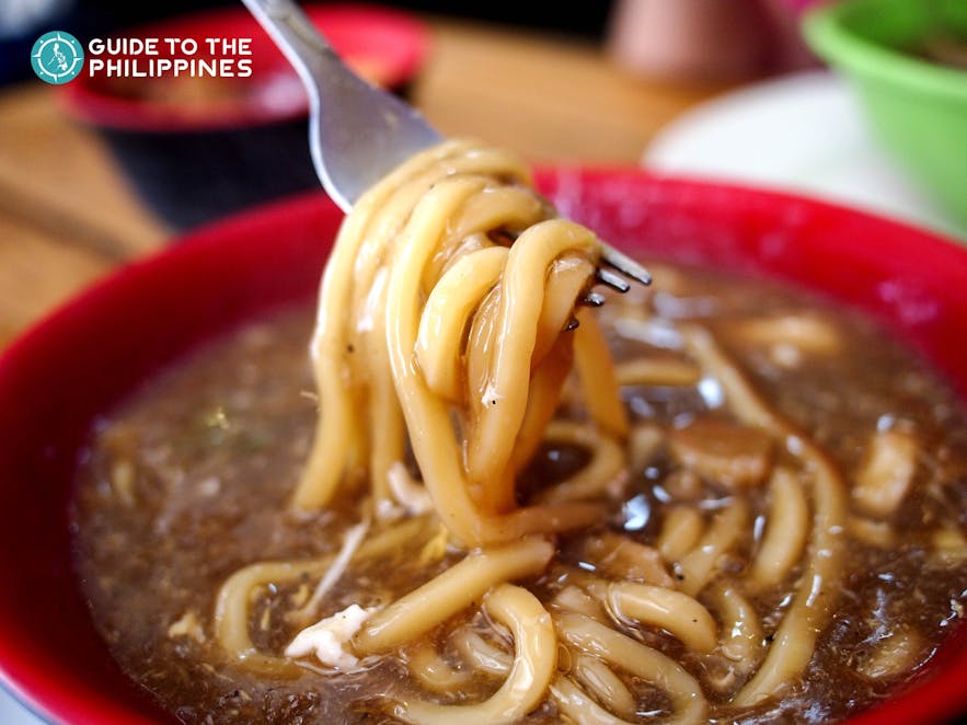 Thick noodles and broth of Batangas Lomi