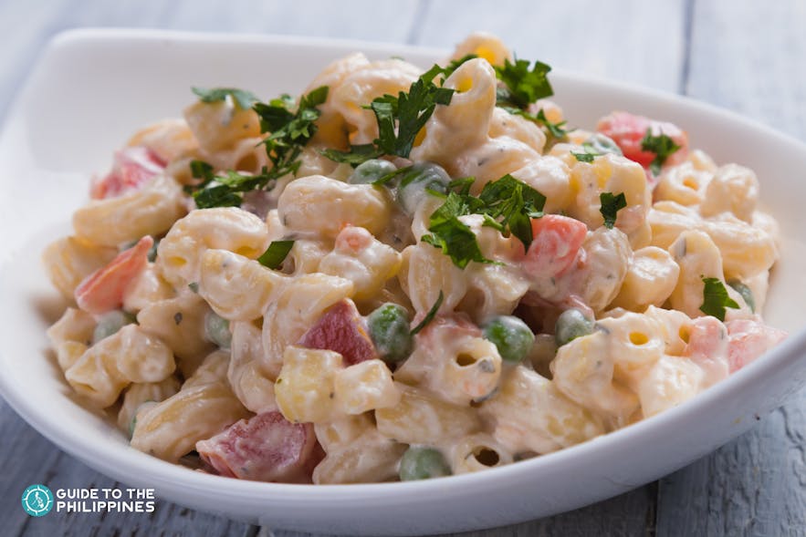A bowl of macaroni salad, a staple in Filipino tables during Christmas