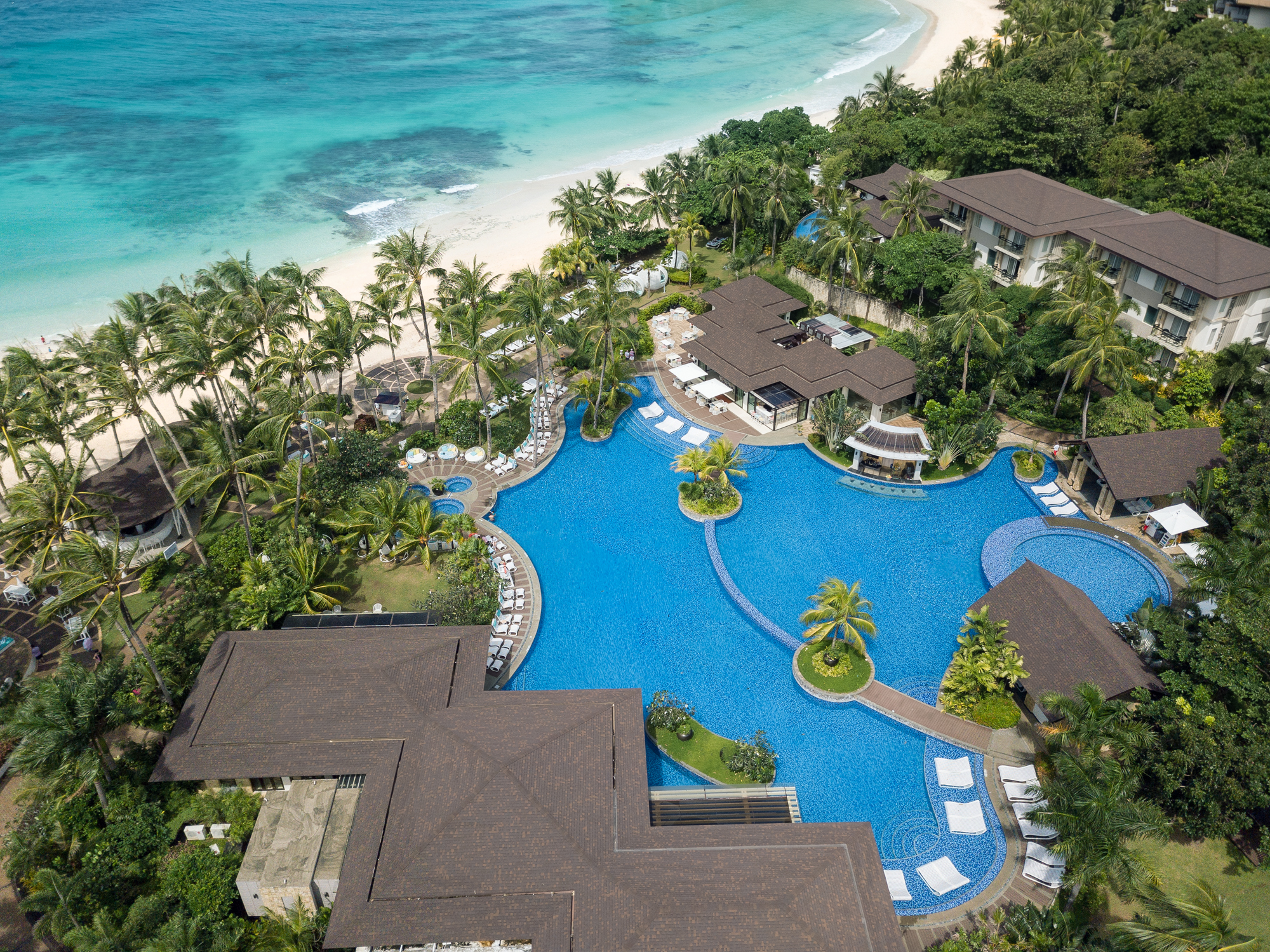 Aerial view Movenpick Resort and Spa Boracay showing Station 0 beach and pool
