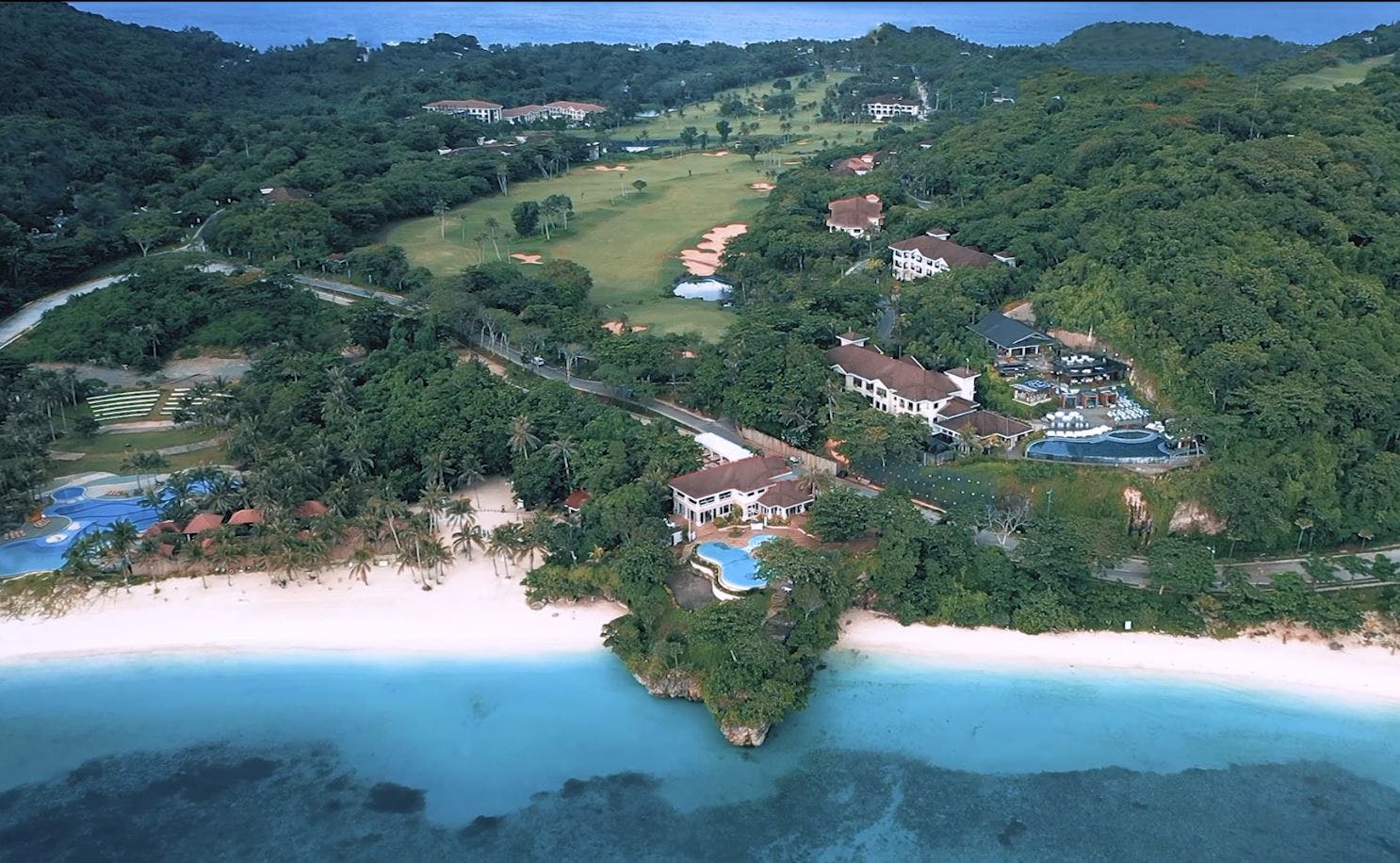 Aerial view of Fairways & Bluewater Resort's wide beach area