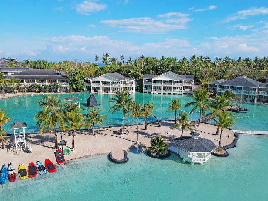 Villas and pool area of Plantation Bay Resort and Spa