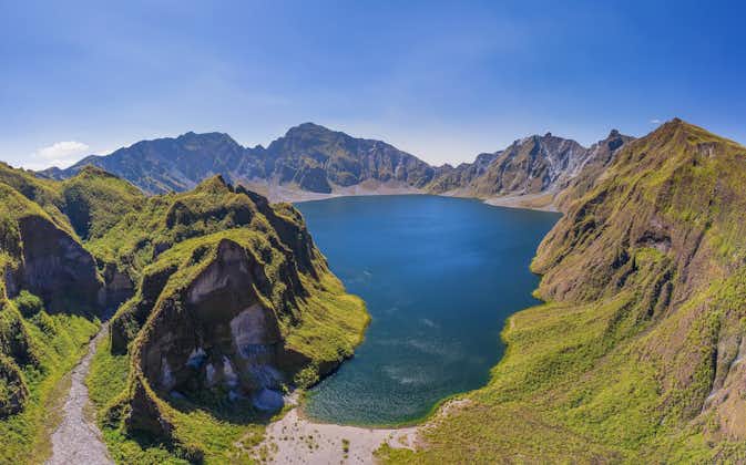 Blue waters and green landscape in Mt. Pinatubo Crater Lake