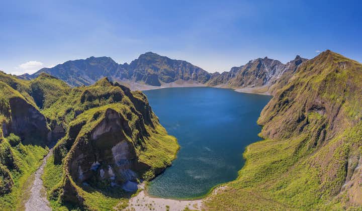 Blue waters and green landscape in Mt. Pinatubo Crater Lake