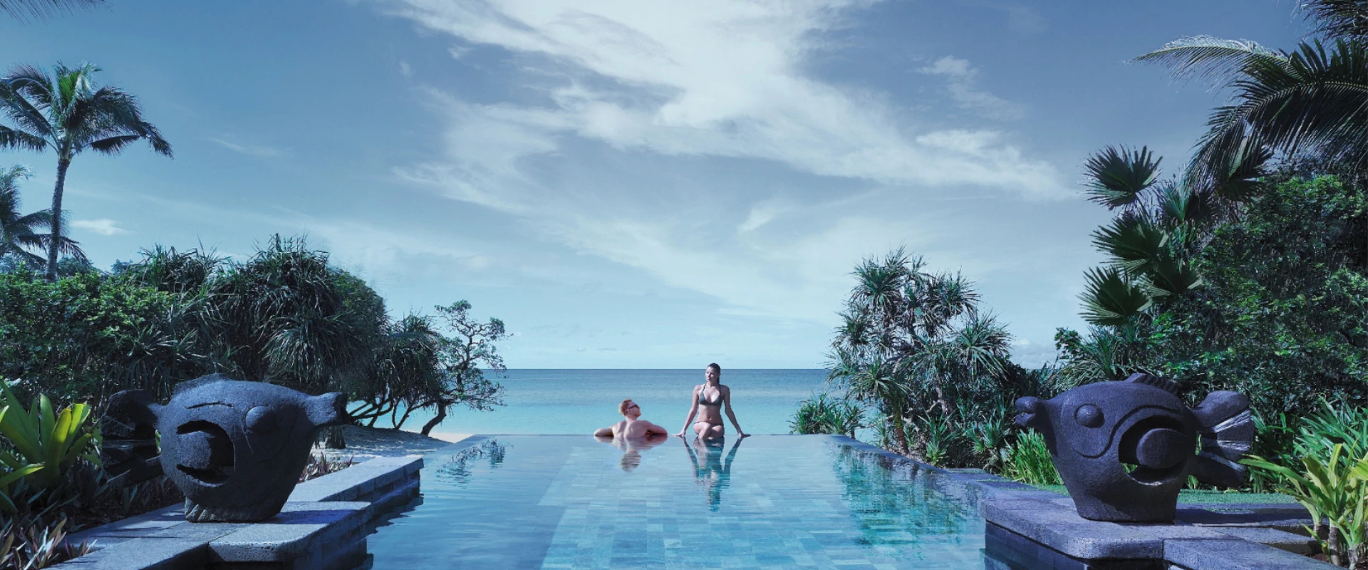 Man and woman at the pool of Shangri-La Resort Boracay