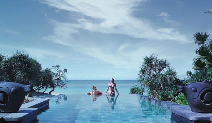 Man and woman at the pool of Shangri-La Resort Boracay