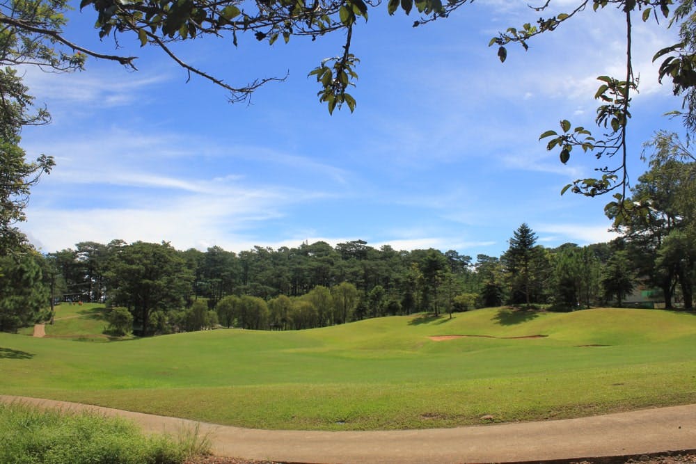 Sunny day on an open field in Camp John Hay, Baguio