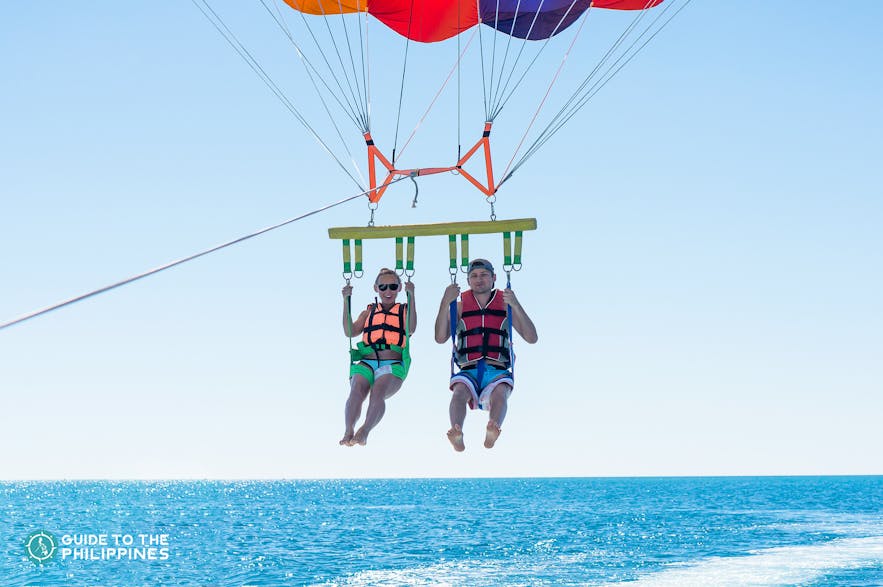 A couple parasailing in Boracay