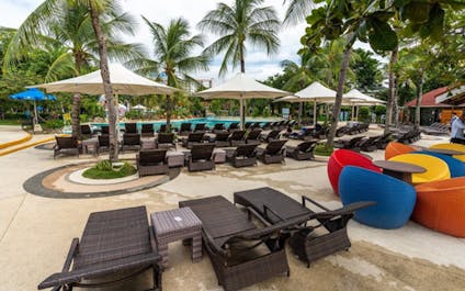 Lounge area by the pool in Jpark Island Resort