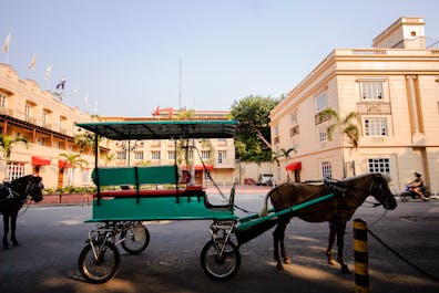 A horse-drawn carriage in front of Intramuros in Manila