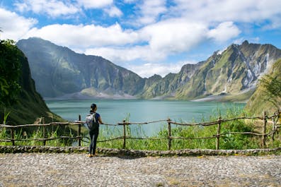 A girl staring at the beautiful scenery of Mt. Pinatubo Crater Lake