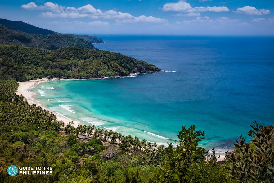 Blue waters of Sabang Beach in Puerto Princesa Palawan