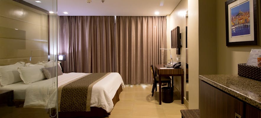 Standard bedroom in Goldberry Suites and Hotel