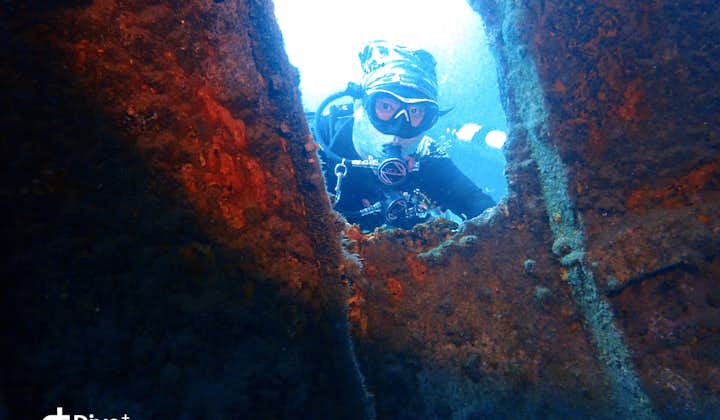 A diver in Alma Jane Wreck Puerto Galera