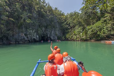 Tourists wearing life vests in Puerto Princesa Underground River