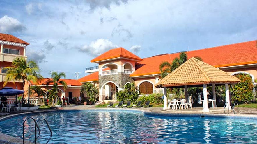Pool area and Facade of Vista Marina Hotel and Resort