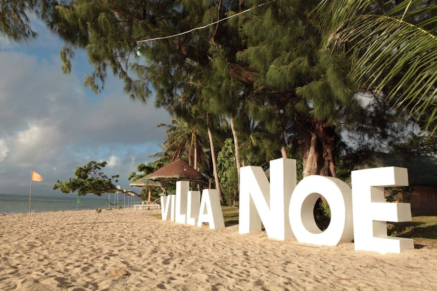 Villa Noe signage on the beachfront property