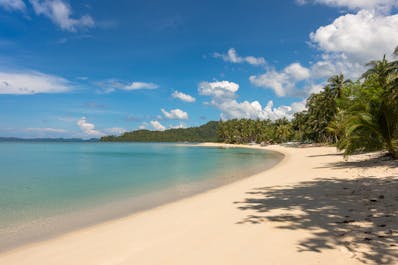 White sand beach in Port Barton Palawan