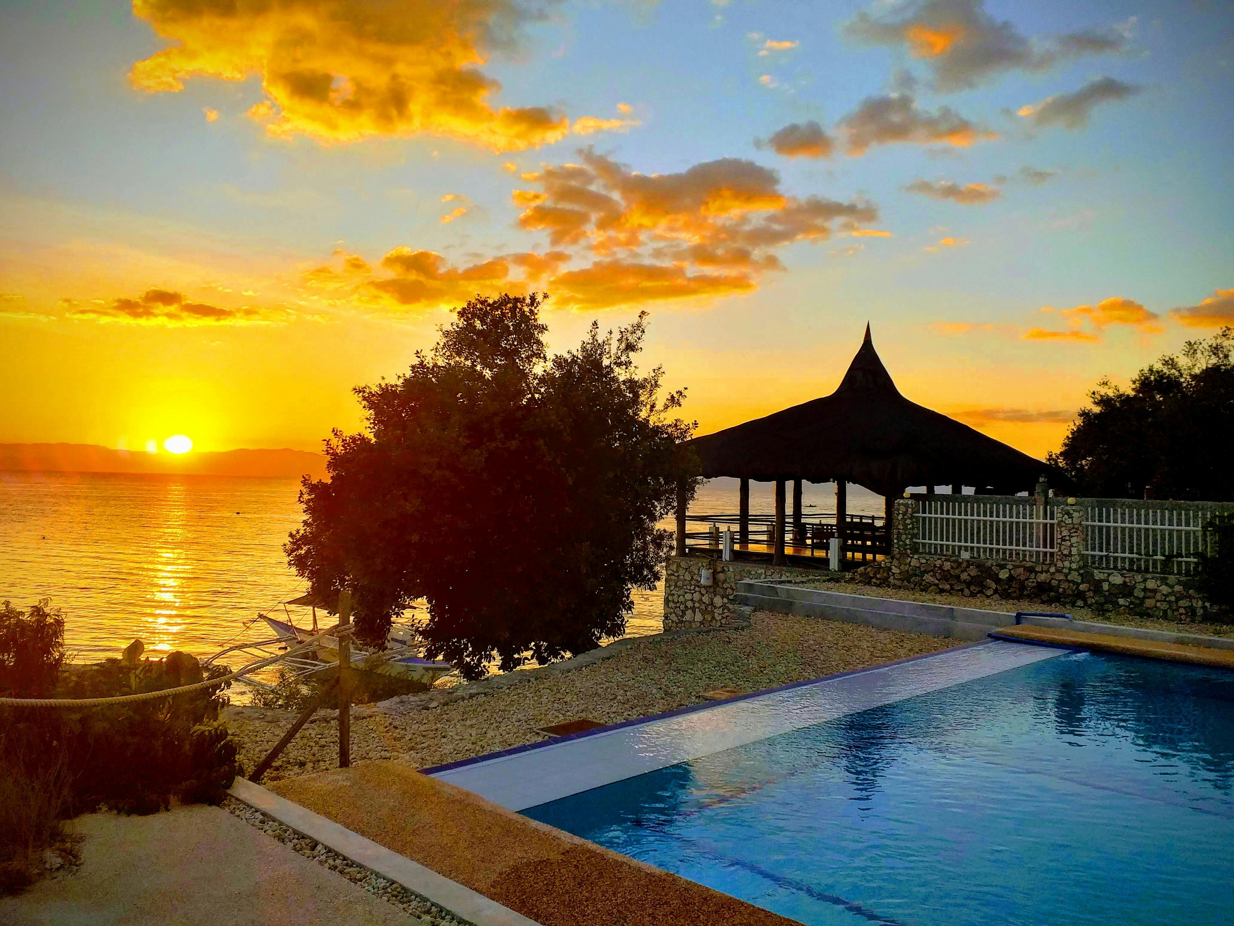 Sunset view from the pool of Cebu Seaview Dive Resort
