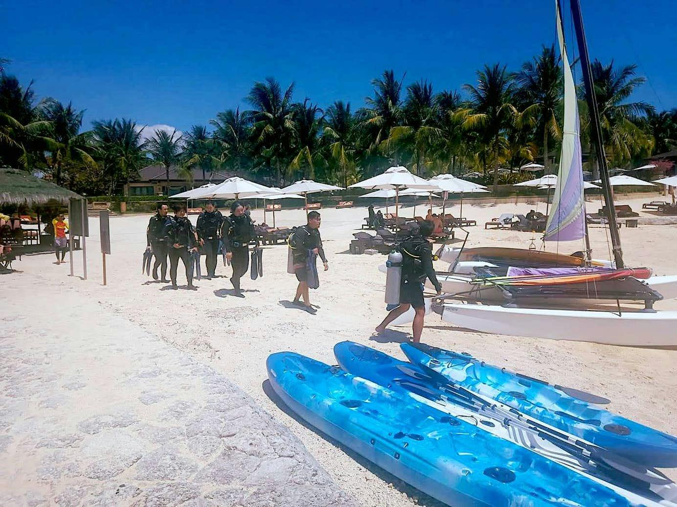 Divers about to board their boat for a diving session in Cebu