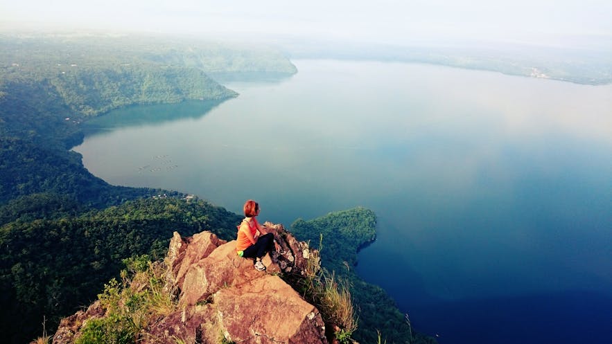 Woman enjoys the view from Mt. Maculot in Batangas