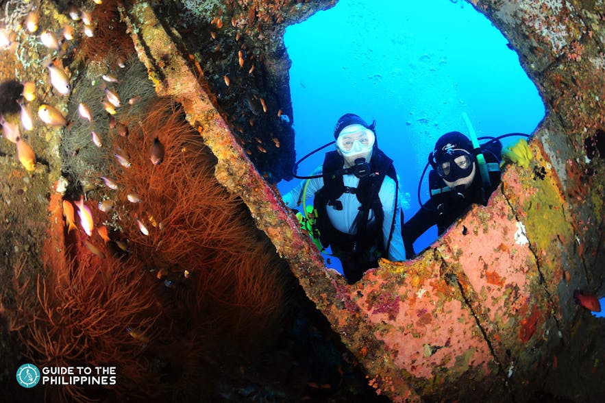 Divers at the Sabang Wreck in Puerto Galera