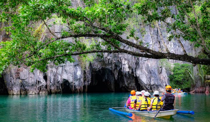 Boat full of tourists in Puerto Princesa Underground River in Palawan